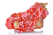 Amazing natural red raw vanadinite mineral stone closeup macro isolated on white background. Orange rough vanadium crystals. 