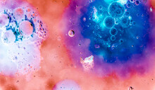 Macro Shot Of Colorful Liquid Bubbles Under The Lights