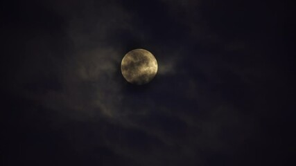 Wall Mural - Creepy full moon behind clouds