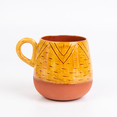 colorful handmade ceramic coffee cup on white