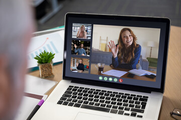 Poster - Diverse business people displayed on laptop screen during office video call