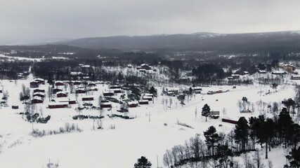 Soft wide aerial view of snowy wintery climate and beautiful scenery