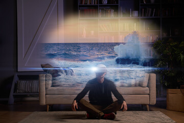 Wall Mural - man uses virtual reality glasses to go to another point of light and meditate to the sound of the se