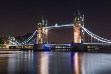 Illuminated Tower Bridge At Night Against Sky