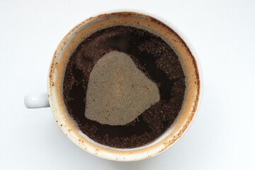 A cup of custard coffee on a white background.