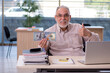 © Elnur - Old male bookkeeper in budget planning concept