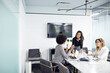 © Cavan Images - Businesswomen having meeting in conference room at office