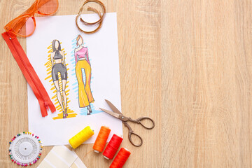 Sticker - Fashion designer workplace with sketch on wooden background