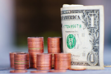 stack of coin on table background and business or finance saving money