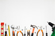 © Oleksandr Kliuiko - Group of used mechanical tools on a white background. With place for text, top view.
