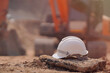 © Surachai - Safety helmet at construction site, road construction site background, safety concept