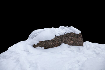 Poster - natural stone in the snow isolated on a black background