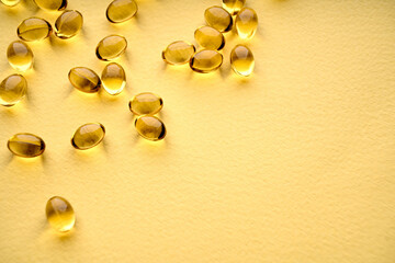 Wall Mural - Omega-3 Fish Fat Oil Capsules. Fish oil capsules isolated on white background. Close up of capsules Omega 3 on white background. Health care concept. Nutritional supplements. Vitamins