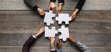 Business Teamwork With Puzzle