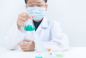 Wall Mural - young scientists shaking blue liquid chemical in erlenmeyer flask isolated on white