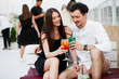 © taras.chaban - couple seating on the beach bar and drink cocktails. couple drink cocktails