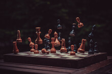 Falling Chess Pieces On The Chessboard