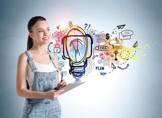 Poster - young woman with clipboard standing over colourful light bulb on a concrete wall