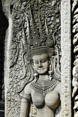 Close-up of a carving of an apsara or dancing female divinity on the outer wall of Angkor Wat in Cambodia