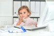 © aletia2011 - Cute little girl using phone in office