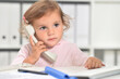 © aletia2011 - Cute little girl using phone in office