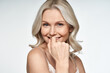 © insta_photos - Happy smiling attractive 50s middle aged blonde woman looking at camera advertising antiage face skin and aging hair care treatment and cosmetics isolated on white background. Close up portrait.