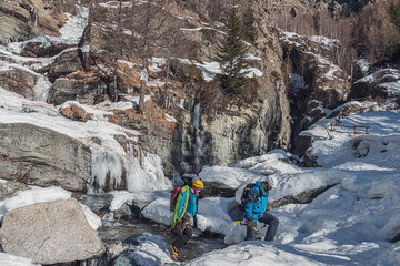 Canvas Print - Hiking on frozen water in winter, Cogne, Aosta Valley, Italy