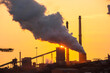 © Cavan Images - Emissions from a Tata steel works in Ijmuiden, Netherlands, at sunset.