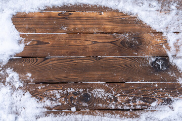 Winter background. Empty wooden plank with snowy border, copy space for text Wood table. For product display Christmas time mock up