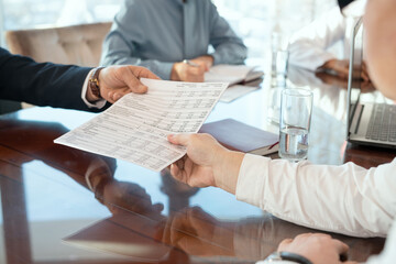 Wall Mural - Hand of mature male delegate taking document with financial data held by partner