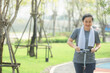 © Suriyo - Portrait Asian women middle aged playing scooter in city park in concept healthy strong insurance retire Financial freedom