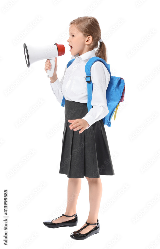 Little schoolgirl with megaphone on white background