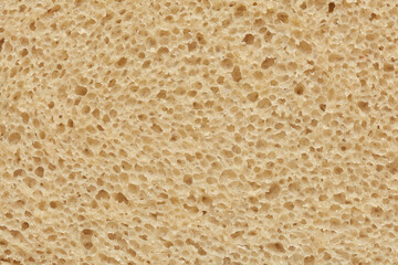 Inside part of sliced rye bread background or texture.