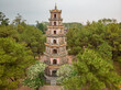 © AmazingAerialAgency - Aerial view of Thap Phuroc Duyen buddhist monument in a park along Perfume river, Hương Long, Vietnam.
