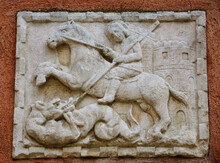 Saint George Slaying The Dragon. Architectural Detail. Bas Relief Sculpture. 