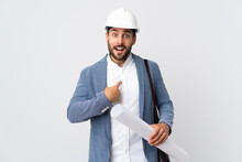 Young Architect Man With Helmet And Holding Blueprints Isolated On White Background With Surprise Facial Expression
