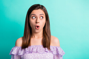 Canvas Print - Portrait of scared impressed girl look empty space wear purple shirt open mouth isolated on blue color background