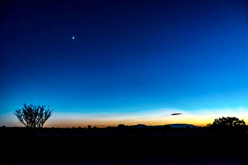 Wall Mural - beautiful sunset over a field in santa fe, new mexico