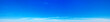 © Pakhnyushchyy - Blue Sky background with tiny Clouds. Panorama background