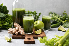 Green Detox Smoothies With Fresh Leafy Vegetables And Ginger