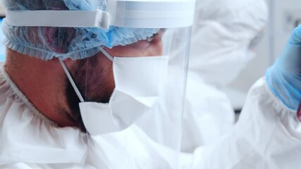 Wall Mural - professional team of scientists is working on a vaccine in a modern scientific research laboratory. 