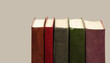 books on gray background. literature in the library. almanac on light texture. old tomes. knowledge concept