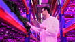 © Halfpoint - Worker with tablet on aquaponic farm, sustainable business and artificial lighting.