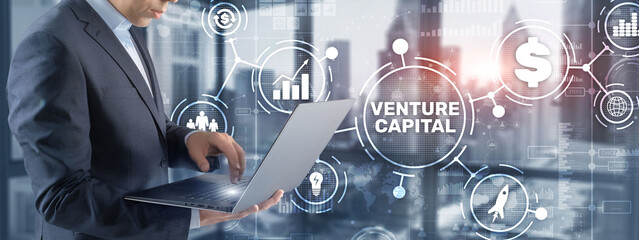 Wall Mural - Venture capital. Investor capital. Businessman pressing virtual screen inscription