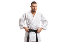 Karate Man Holding His Black Belt And Smiling At The Camera