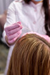 © alfa27 - Doctor apply serum on female head, vitamins in woman skin head for hair growth and against dandruff in cosmetology clinic, closeup view. Hairs cure. Trichology in medicine.