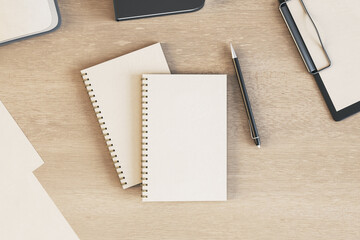 Aufkleber - Blank white diaries cover with pen on light wooden table. Mockup