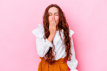 Wall Mural - Little caucasian girl isolated on pink background yawning showing a tired gesture covering mouth with hand.