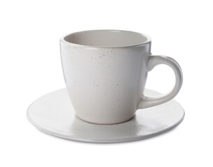 New clean ceramic cup and saucer on white background