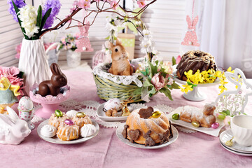 Poster - traditional Easter variety of cakes on festive table